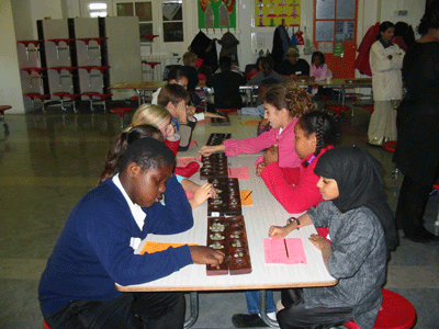 Pupils from various Primary Schools facing each other in tense competition