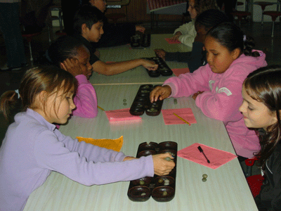 Pupils from various Primary Schools facing each other in tense competition