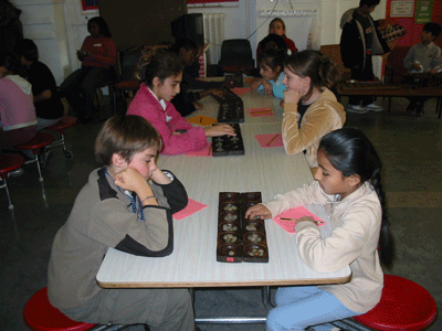 Pupils from various Primary Schools facing each other in tense competition