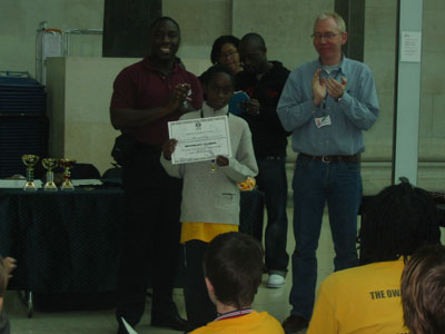 Kieran Smalling receiving his certificate of participation.